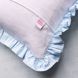 Frilled striped bow cushion