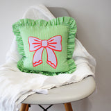 Frilled striped bow cushion