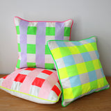 Neon check screen printed cushion