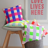 Neon check screen printed cushion
