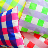 Neon check screen printed cushion