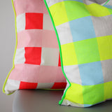 Neon check screen printed cushion
