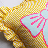 Frilled striped bow cushion