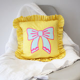 Frilled striped bow cushion