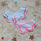 Striped scalloped bib