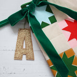Bright personalised quilted Christmas stocking