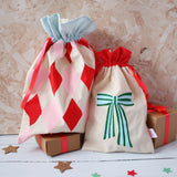 Bright reusable Christmas gift bags